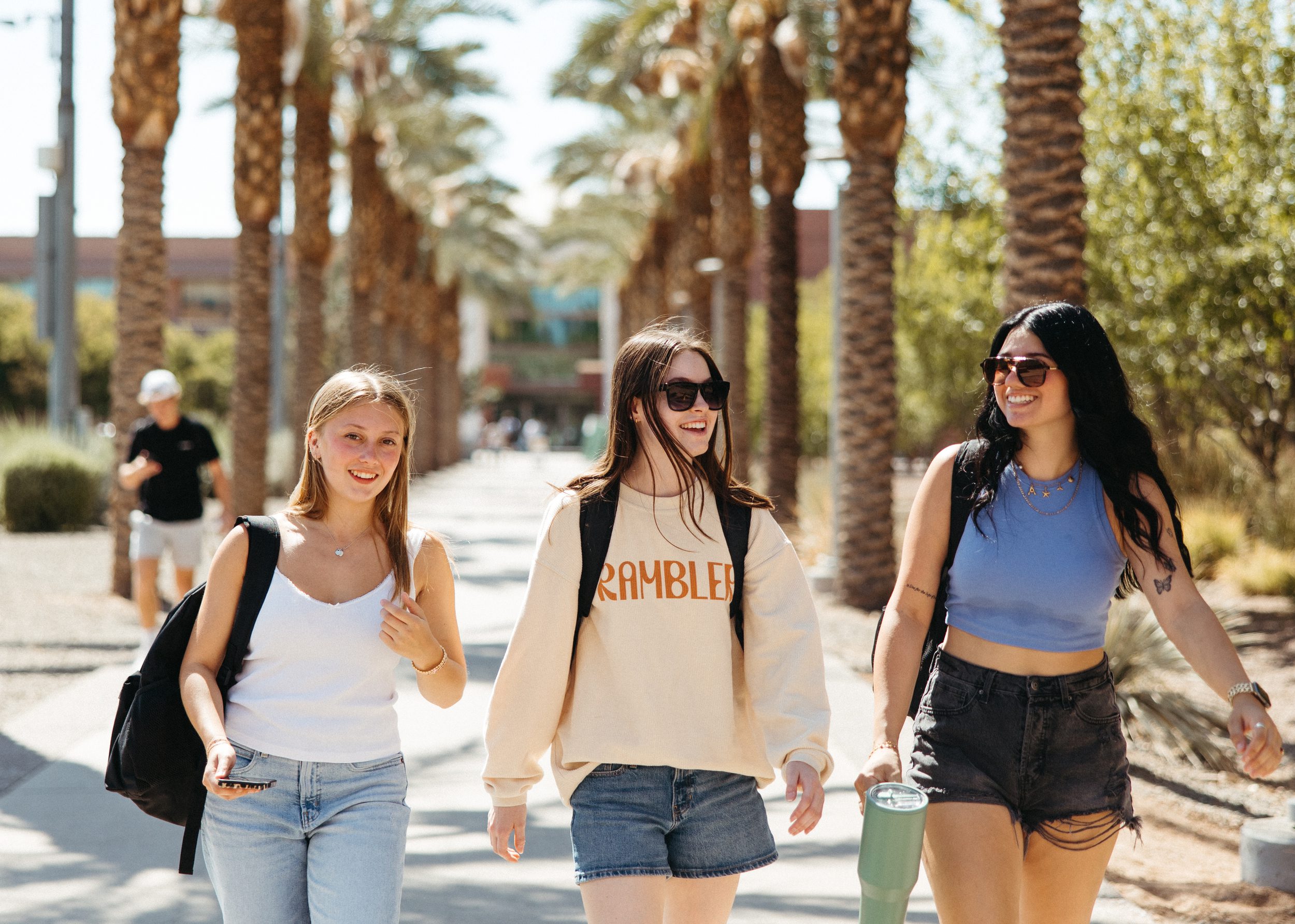 3 ASU girls walking on campus
