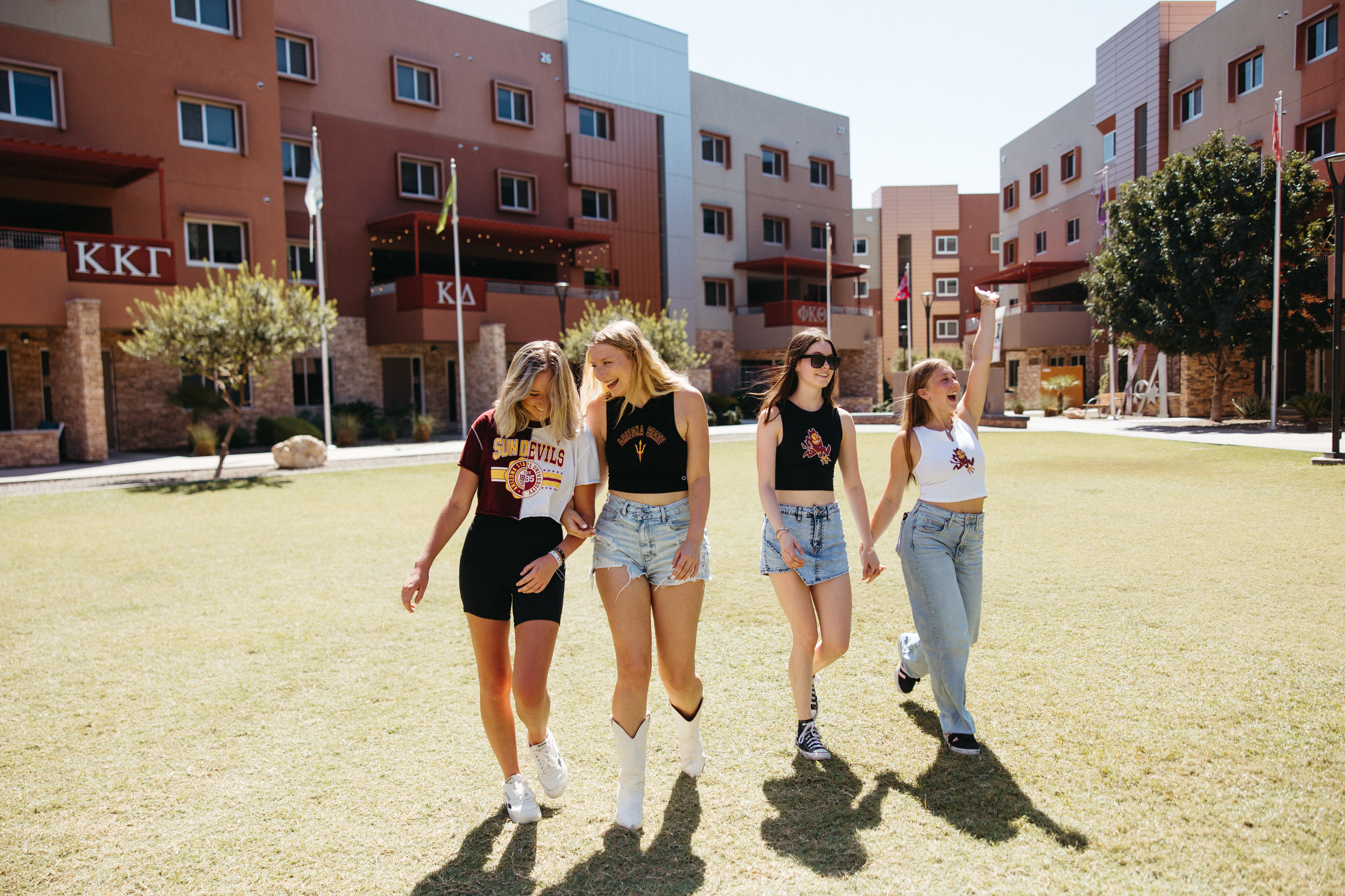 ASU students walking around ASU greek leadership village (GLV)