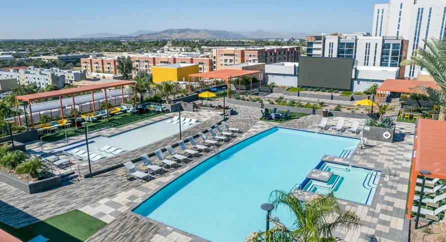 Image of exterior buildiing and pool area of Apollo Tempe
