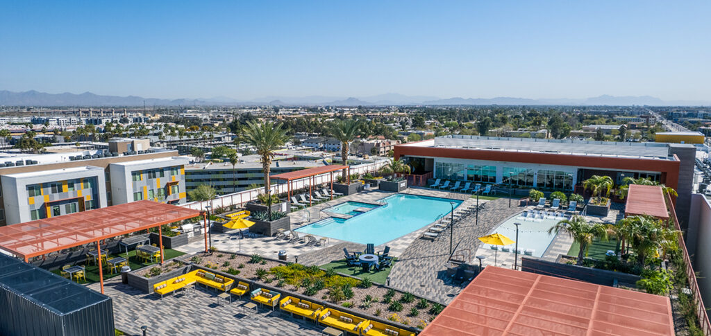 Image of exterior buildiing and pool area of Apollo Tempe