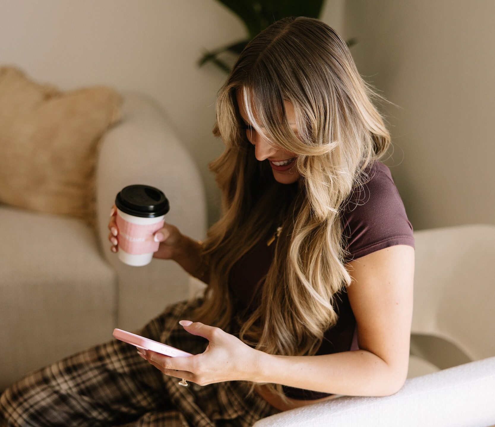 Girl on her phone in the living room