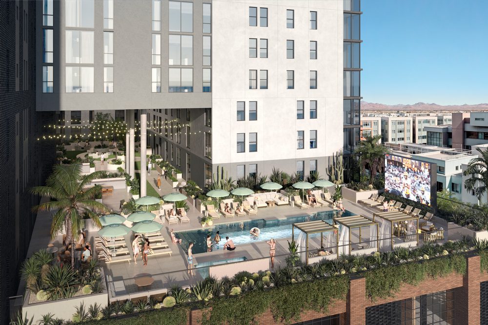 Enjoy stunning Tempe skyline view from Rambler Tempe’s rooftop pool deck, with sun chairs and a hot tub for ultimate relaxation.