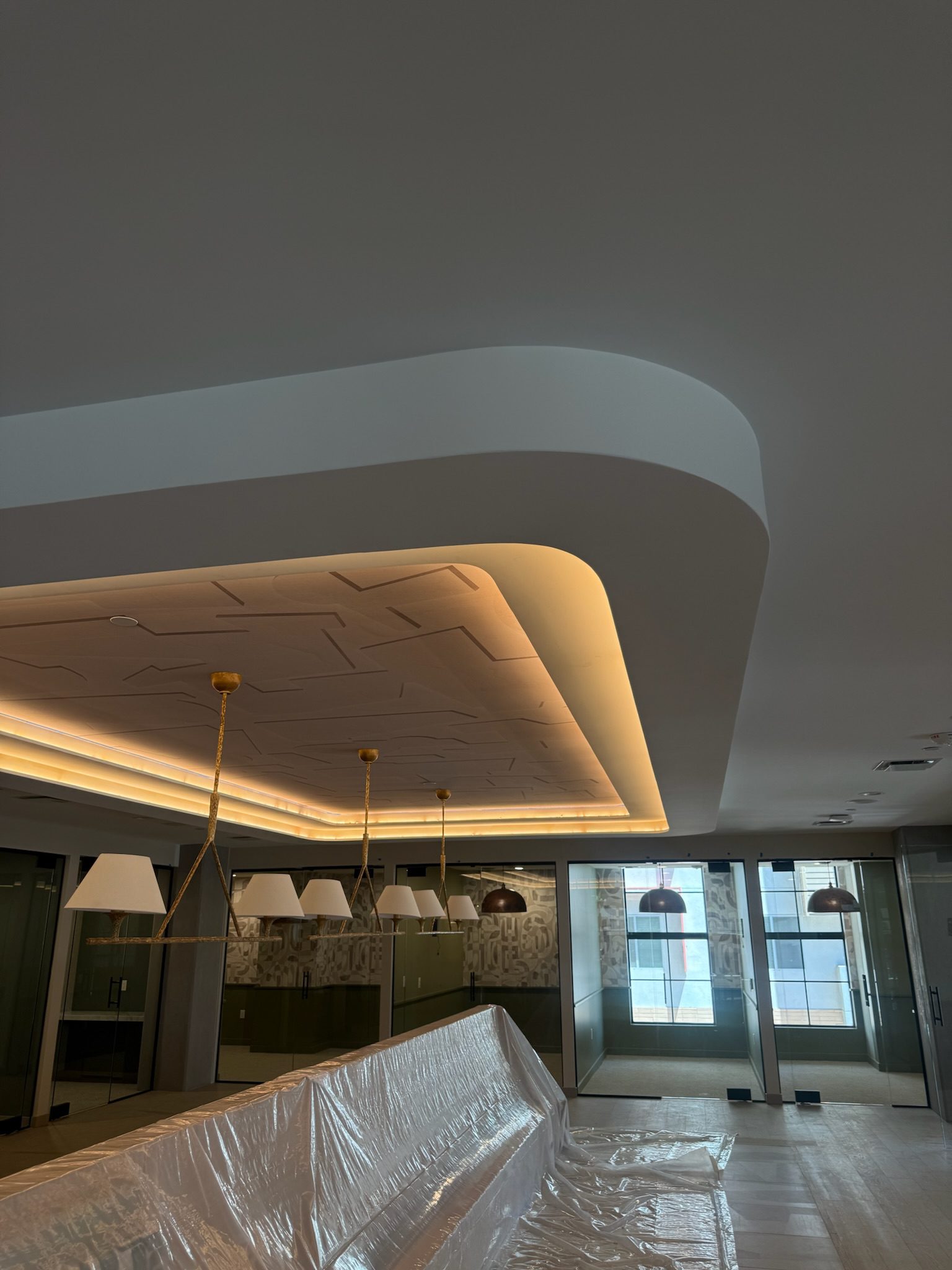 The study mezzanine tiling and lighting pieces all complete.