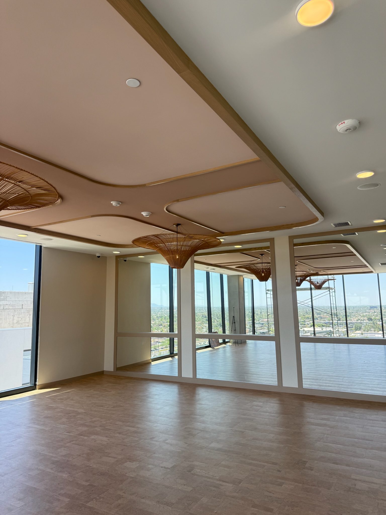 Mirrors installed in The Studio on the 15th floor with reformers and equipment on the way.